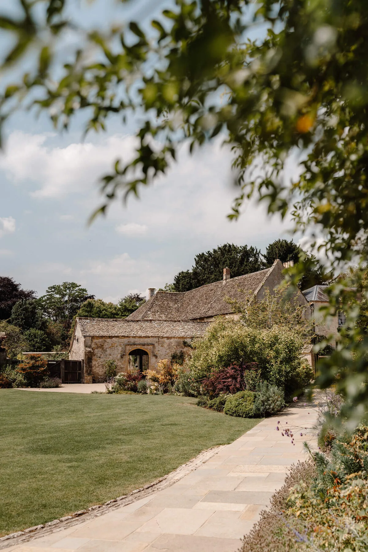 Caswell House Cotswold venue gardens in sunshine